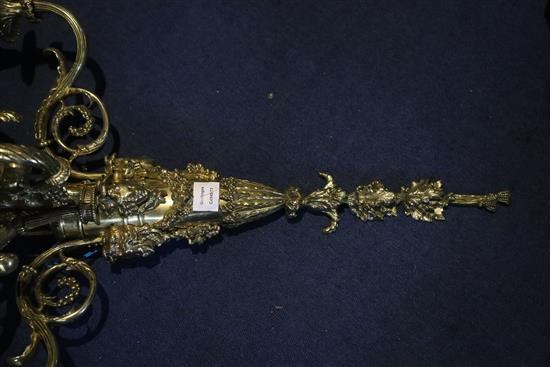 A pair of late Victorian ornate cast brass five branch wall lights, width 22in. depth 11in. height 39in.